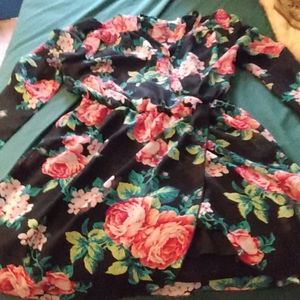 Small silky black formal dress with red and pink flowers with green stems long